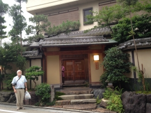 John Bryant outside entrance of Kinoe Ryokan