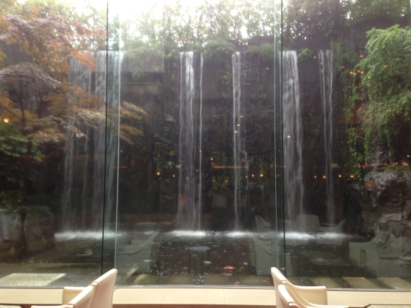 Waterfall outside picture window of Kyoto’s Crowne Plaza Hotel